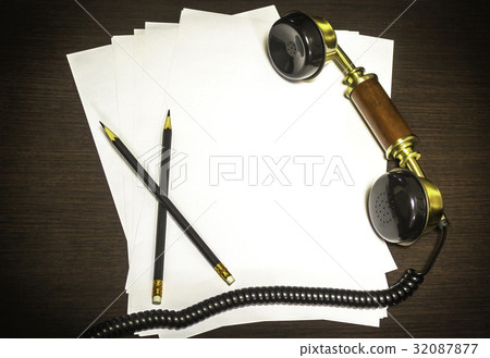 Vintage earphone on wooden background Vintage earphone on wooden background 32087877