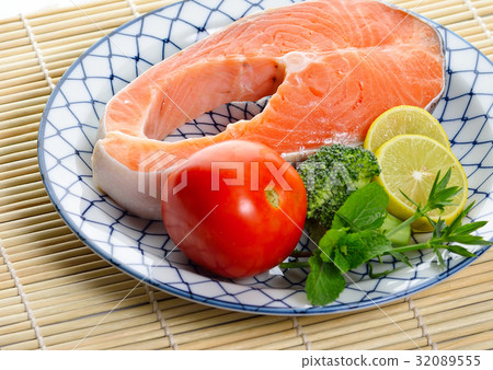fresh salmon fillet with vegetables and lemon fresh salmon fillet with vegetables and lemon 32089555