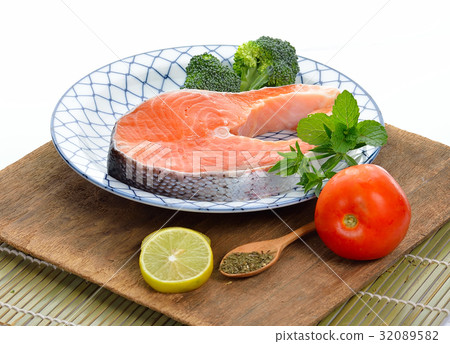 fresh salmon fillet with vegetables and lemon fresh salmon fillet with vegetables and lemon 32089582