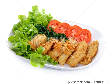 Fish dish - fried fish fillet with vegetables 32089583