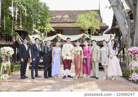 A picture of a group at the wedding ceremony. 32090247