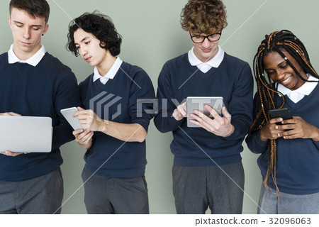 Group of Diverse High School Students Using Digital Devices Studio Portrait 32096063