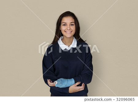 Young Student in Uniform with Broken Arm Studio Portrait 32096065