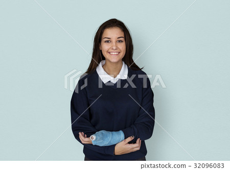 Young Student in Uniform with Broken Arm Studio Portrait Young Student in Uniform with Broken Arm Studio Portrait 32096083