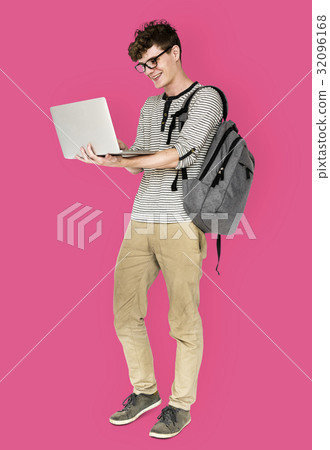 Young man standing using laptop connection 32096168