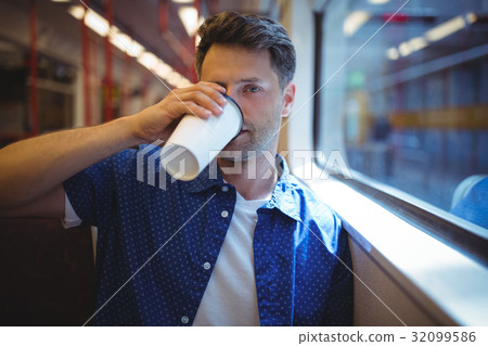 Handsome man drinking coffee 32099586