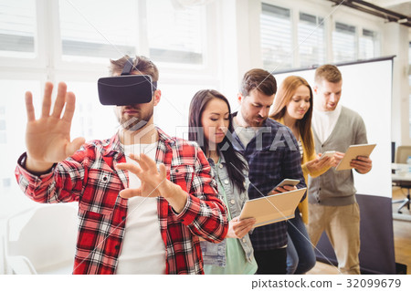 Creative business people using technologies 32099679