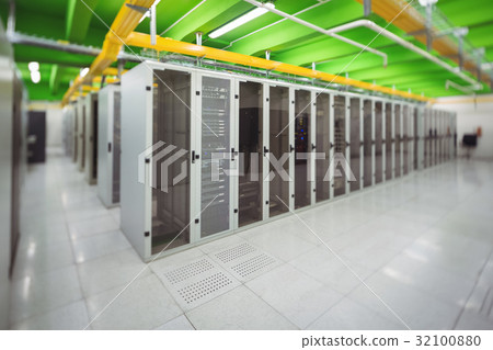 Hallway with a row of servers 32100880