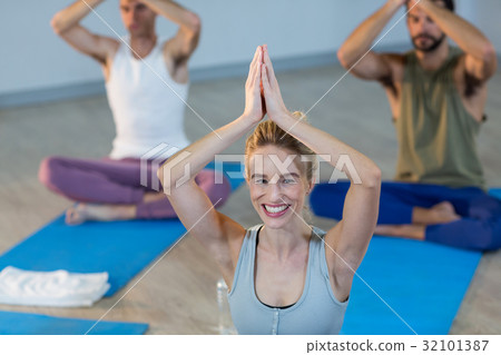 Beautiful woman performing yoga Beautiful woman performing yoga 32101387