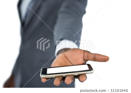 Businessman holding mobile phone 32101648