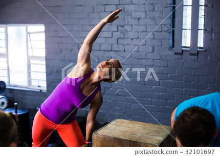 Female athlete exercising Female athlete exercising 32101697