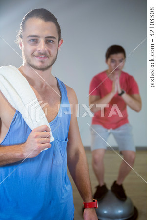 Fitness man standing in gym 32103308