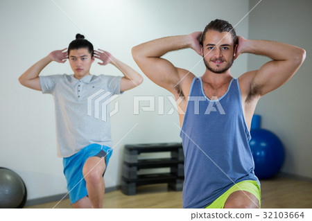 Smiling two men doing aerobic exercise 32103664