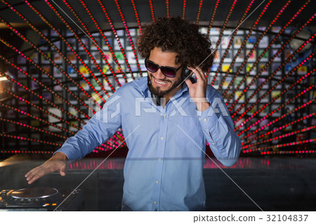 Male DJ playing music Male DJ playing music 32104837
