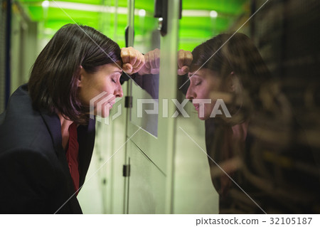 Technician getting stressed over server maintenance 32105187