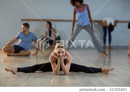 Woman performing stretching exercise 32105803