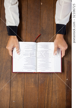 Woman with a bible 32106725