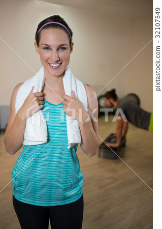 Portrait of smiling woman with napkin 32107849