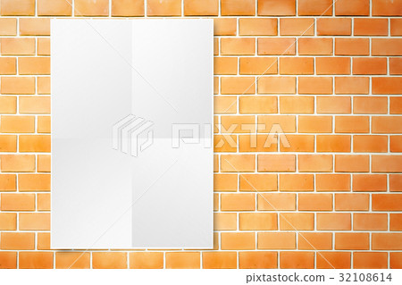 Black White paper poster hanging at brick wall Black White paper poster hanging at brick wall 32108614