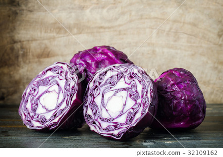 Purple cabbage on wooden background Purple cabbage on wooden background 32109162