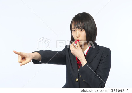 School girl who blows whistle School girl who blows whistle 32109245