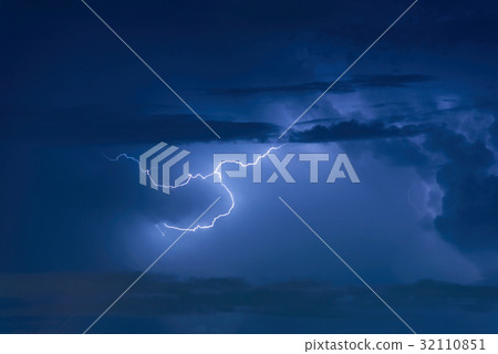 Thunder storm lightning strike on the dark sky 32110851