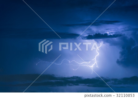 Thunder storm lightning strike on the dark sky 32110853
