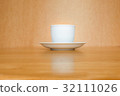 A white cup of coffee 32111026