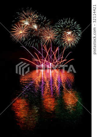 Firework.Beautiful colorful fireworks on the water Firework.Beautiful colorful fireworks on the water 32114421