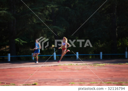 Blurred view of woman athletic running competition Blurred view of woman athletic running competition 32116794