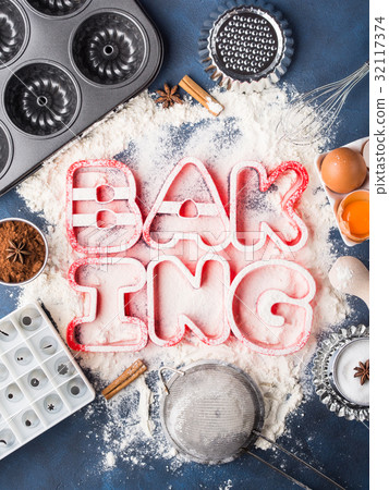 Flour letters spelling Baking with ingredients 32117374