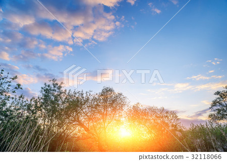 Beautiful sunset above rural lane.  32118066