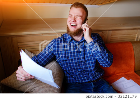smiles mature man holding paper smiles mature man holding paper 32121179