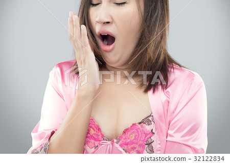 Yawning tired woman 32122834