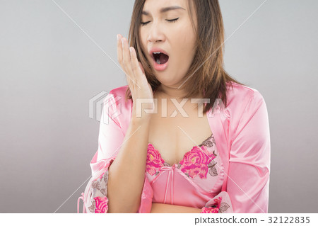 women are yawning after she wake up women are yawning after she wake up 32122835