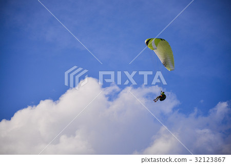 Paragliding extreme Sport with blue Sky and clouds 32123867