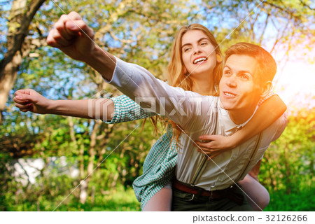 couple raising their hands in open air 32126266