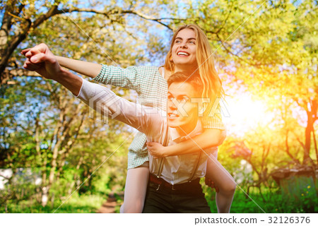 couple raising their hands in open air 32126376
