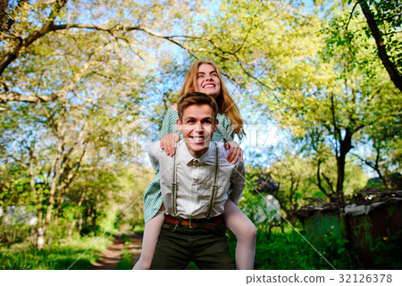 couple raising their hands in open air 32126378