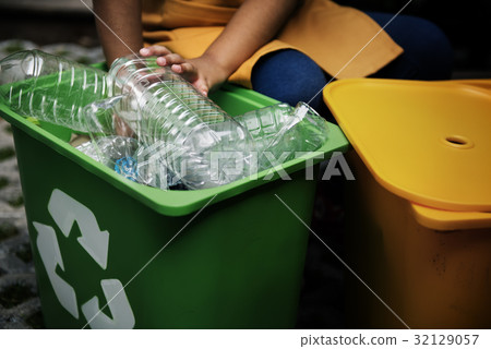 African Descent Kid Separating Recyclable Trash 32129057