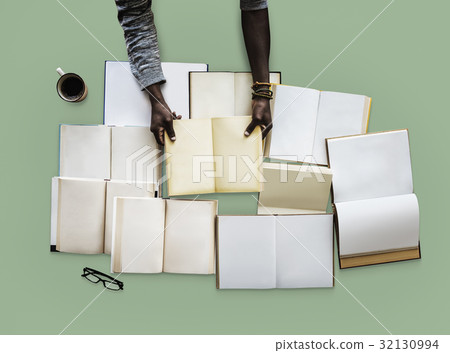 Hand with a empty book collection Hand with a empty book collection 32130994