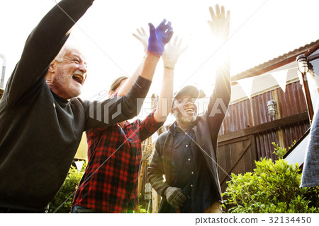 Group of people gardening backyard together Group of people gardening backyard together 32134450