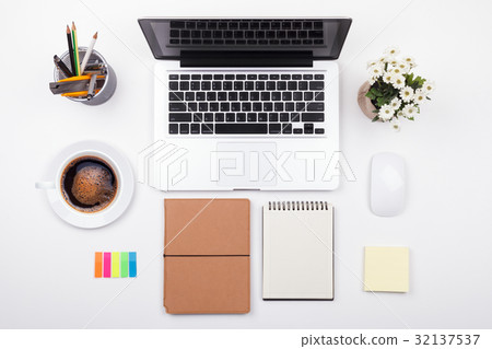 businessman's desk with laptop and office supplies businessman's desk with laptop and office supplies 32137537