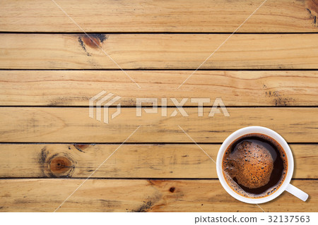 A cup of coffee on wood texture background 32137563