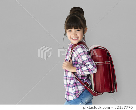 Young asian kid student with a backpack studio portrait 32137770
