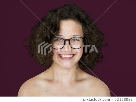 A happiness girl with eyeglasses smiling A happiness girl with eyeglasses smiling 32138082