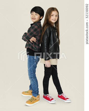 Boy and girl are posing on a shoot Boy and girl are posing on a shoot 32138092