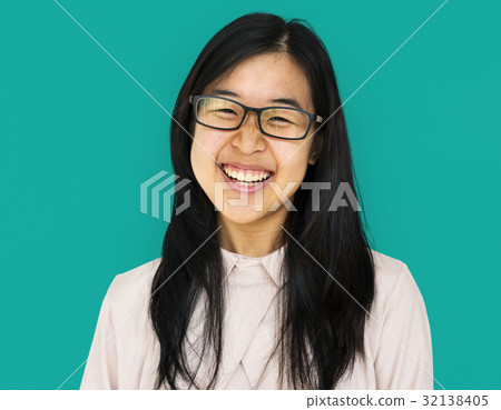 Young asian girl smiling studio portrait Young asian girl smiling studio portrait 32138405