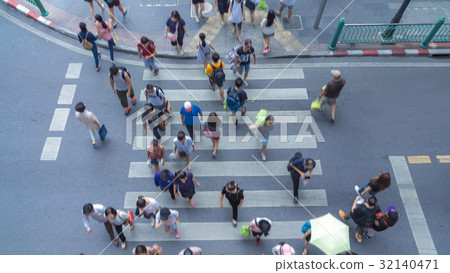 Blur people walk in the crosswalk street city Blur people walk in the crosswalk street city 32140471
