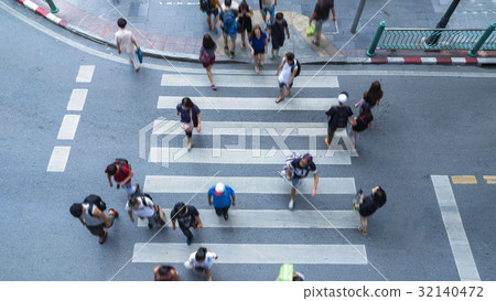 Blur people walk in the crosswalk street city Blur people walk in the crosswalk street city 32140472